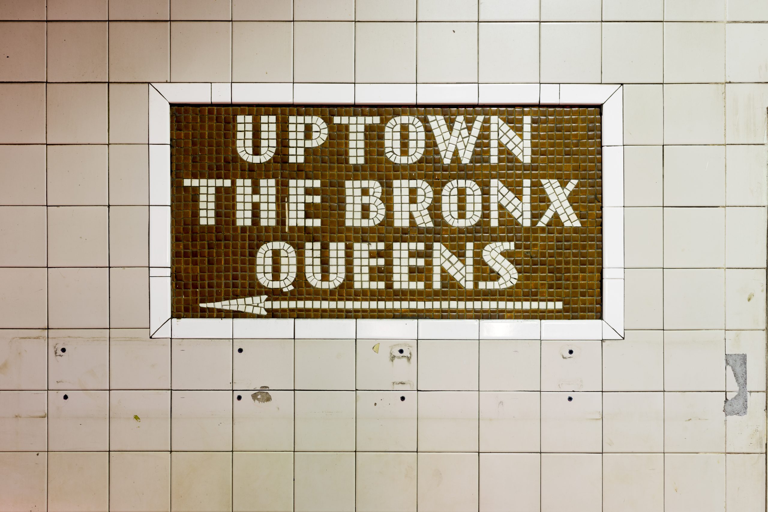NYC uptown Manhattan subway sign property owners